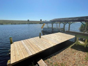 Rim Canal Cottage 'Yellow House' with Canal Views & Boat Dock cottage